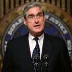 Photo: The director of the FBI, Robert Muller, celebrates the press conference